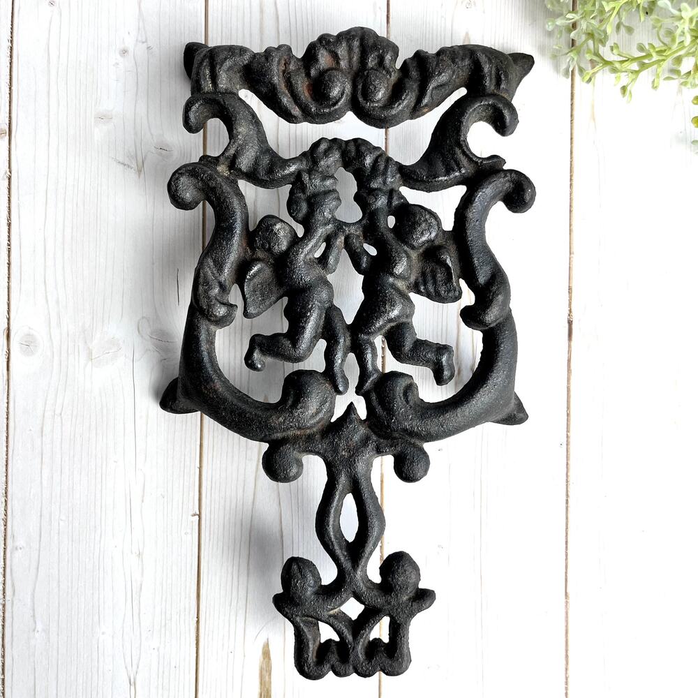Vintage Wilton Cast Iron Trivet Cupid Angel Cherub Scroll Wall Table Decor